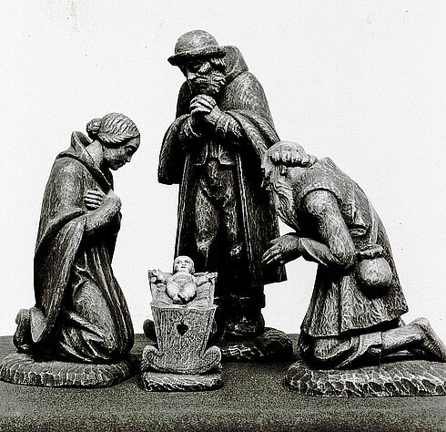 Schwarzweißfoto der Figuren von Maria, Josef und eines Hirten