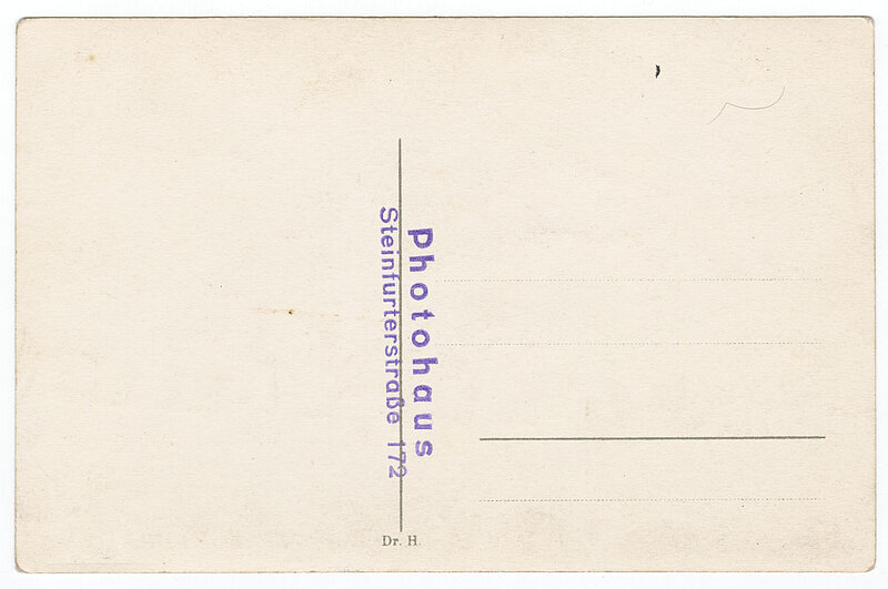 Rückseite einer Postkarte. Text: Photohaus Steinfurterstraße 172